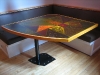Dining nook for Pat's place. Table consists of items embedded in different colors of resin.