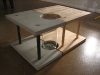 Concrete, steel, maple and glass coffee table.